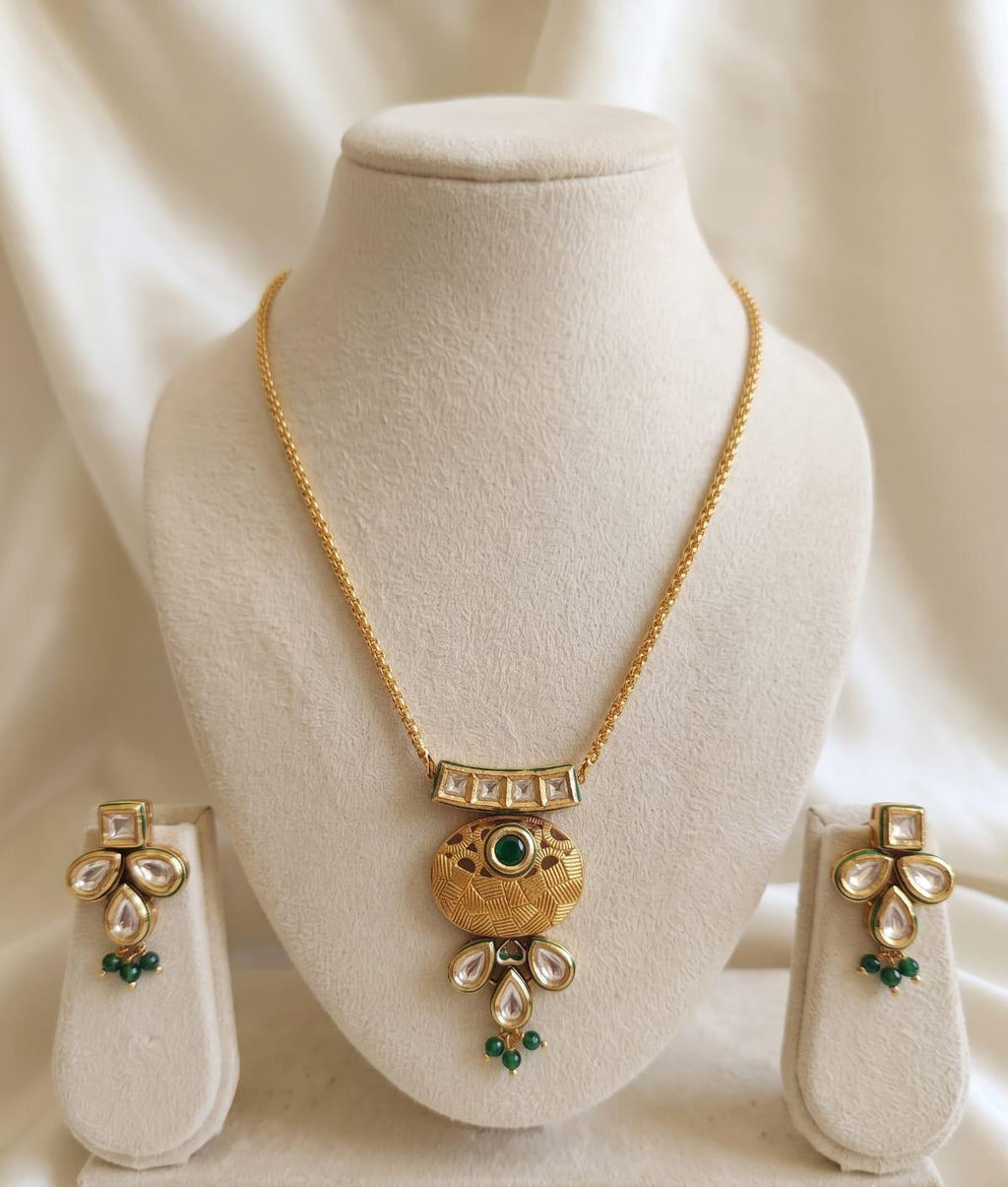 24 Carat Matt Gold Plated Emerald AC Kundan Necklace Set